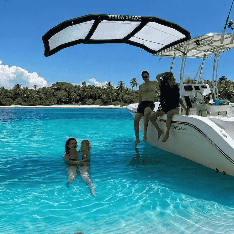 White Sebba Shade in the wind over family