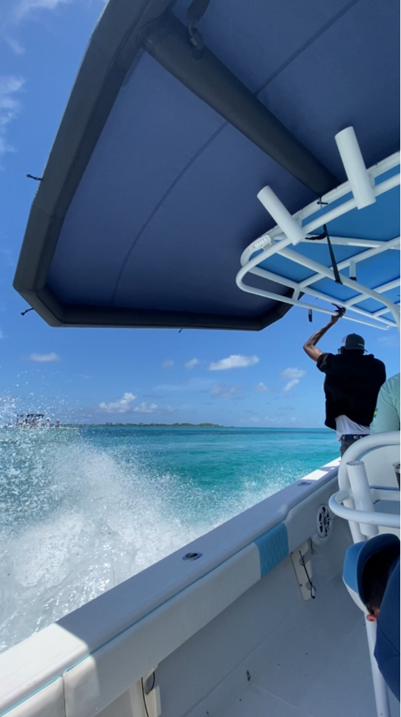 photo of fast boat with shade