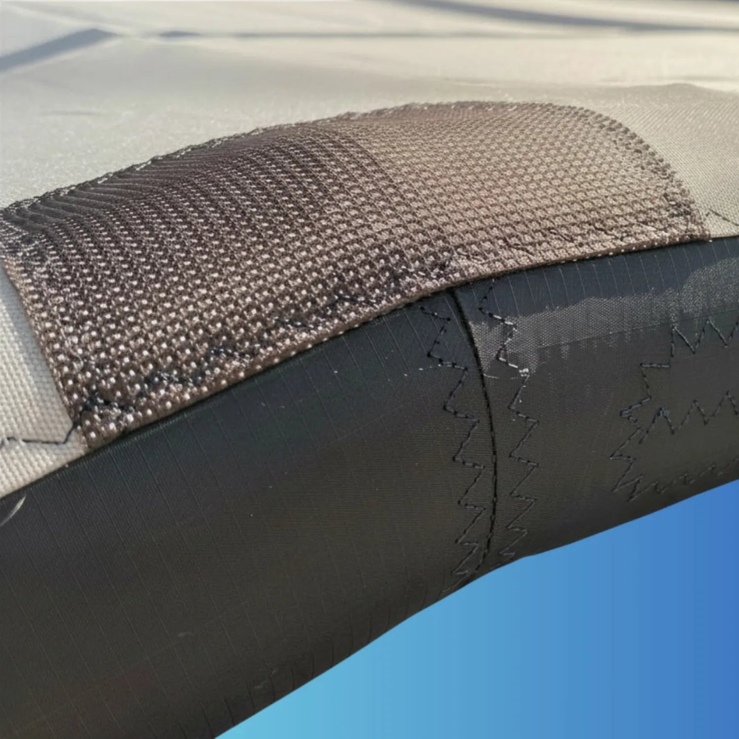Detail of the Teflon® abrasion-resistant patch positioned above the strut junction to protect the Sebba Shade from hardware friction and wear.