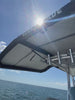 Close-up technical view of a Sebba Shade 6x9 airframe remaining rigid and aerodynamic at 45 mph cruising speed on a center console boat.