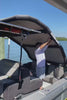 Video showing the Sebba Shade instantly deflating on a boat deck, followed by the user easily folding the canopy and stowing it away in the heavy-duty marine duffel bag in under 60 seconds.