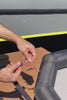 Video demonstrating how to lock the low-stretch Dyneema cord into the Sebba Shade pigtail matrix, clip the central buckle, and cinch the straps drum-tight for high-speed cruising.