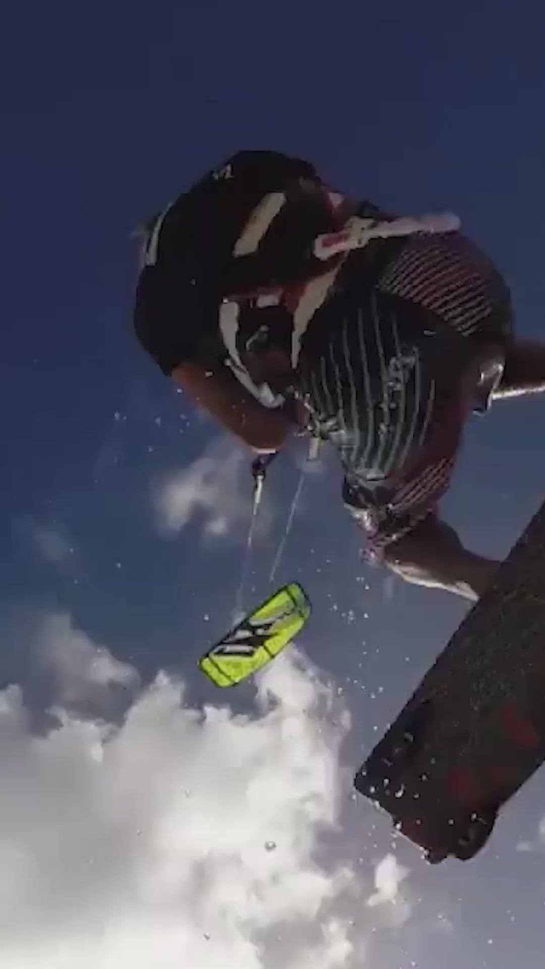Vertical video of a high-pressure kiteboarding sail remaining rigid in extreme wind, demonstrating the airframe engineering heritage that powers the 45 MPH Sebba Shade marine canopy.