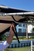 Video showing how to securely loop the Sebba Shade polyester straps around a boat's T-top or Bimini frame without any drilling or metal hardware.