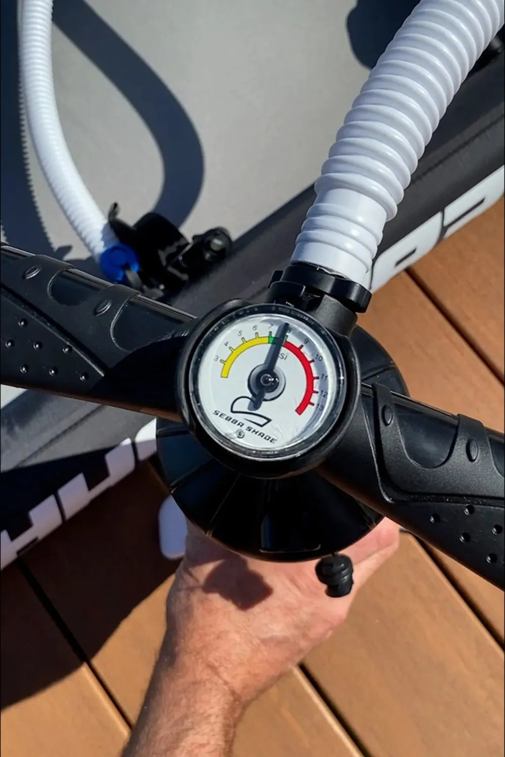 Activating the high-pressure 8.0 PSI AeroCasing™ airframe with a dual-action pump for rapid, tool-free deployment.