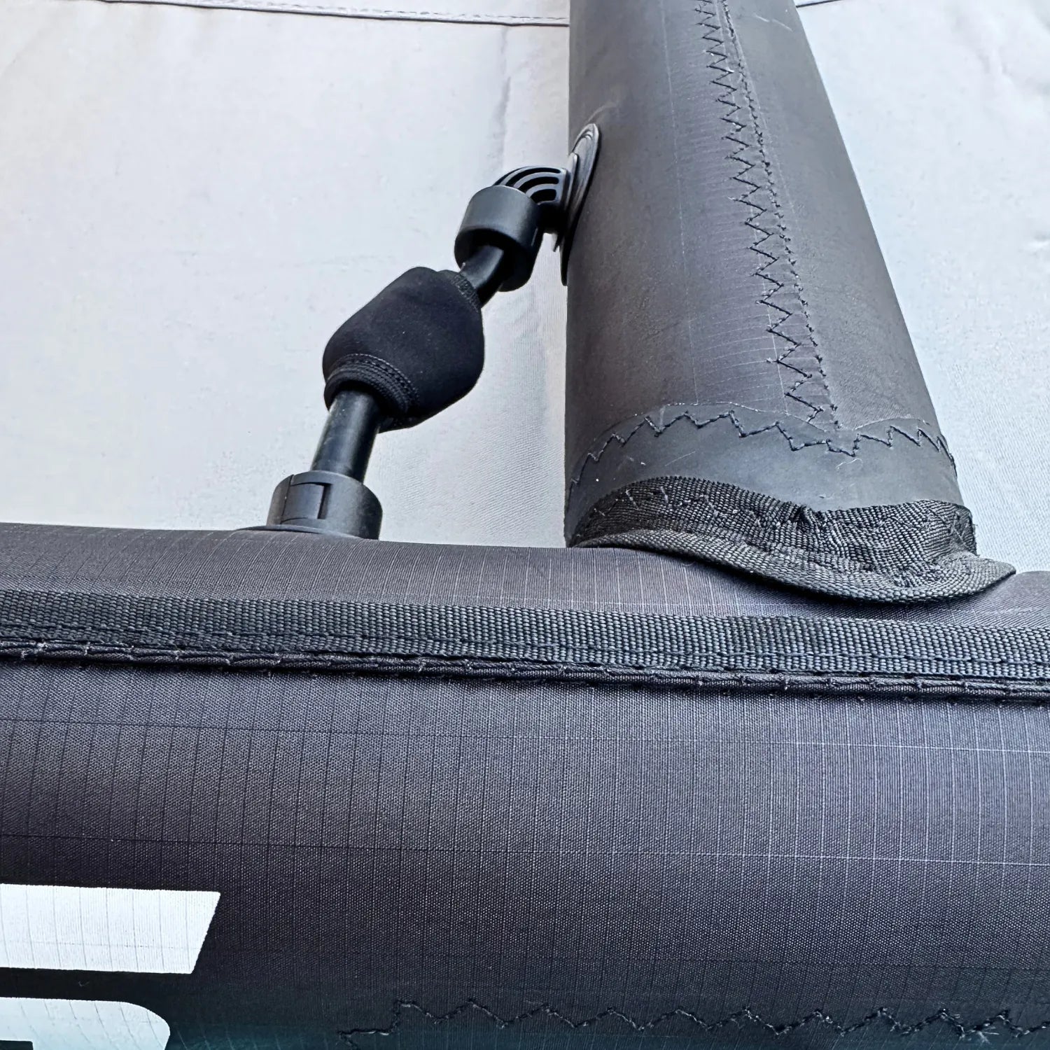 Technical close-up of the AeroLink™ device at the strut-to-perimeter junction, demonstrating the proprietary internal airflow system and reinforced stitching.